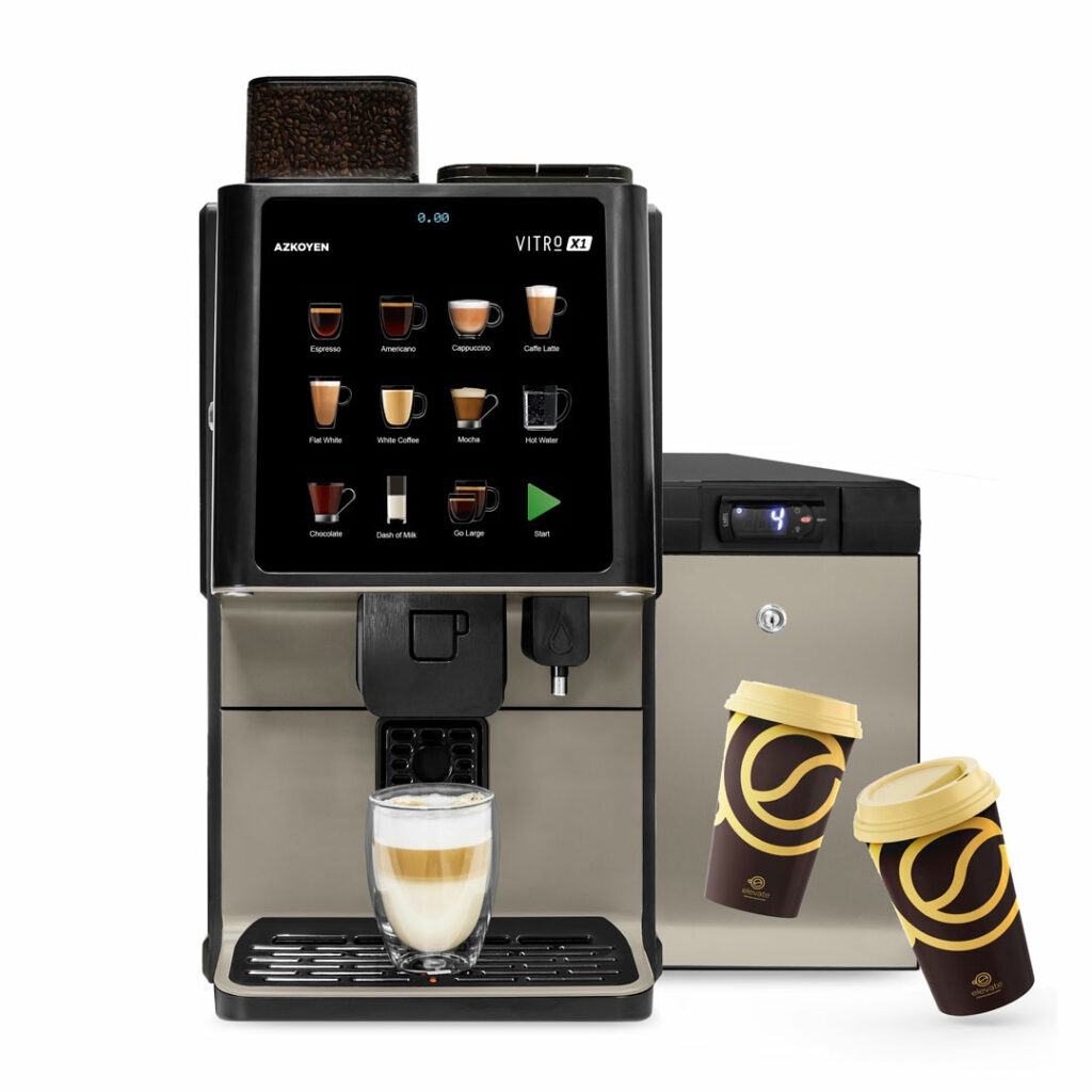Coffetek Vitro X1 coffee machine dispensing a cappuccino with a branded Elevate takeaway cup next to it